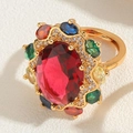 Anillo de lujo dorado con gran gema roja ovalada y circonitas de colores vivos - Abierto Ajustable / Rojo