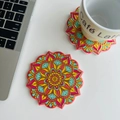 Detail shot of vibrant pink and turquoise mandala ceramic coasters with gold foil finish - Red Gold Mandala