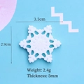 Macro view of a 3.3cm white resin snowflake accessory with glitter for DIY crafts - Medium Sun Heart Snowflake (3.3cm) / White