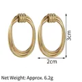 Detail view of 14K gold-plated irregular oval earrings with size markings 3cm by 2cm - Style C (Oval Multi-Layer)