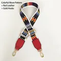 Detail of colorful geometric wave pattern bag strap with red leather ends and gold metal hooks - Colorful Waves Red Leather Gold Hook