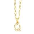 Macro shot of gold letter Q pendant featuring micro-pave white zircon inlay and delicate chain - Letter Q