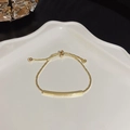 Elegant gold-tone pearl bracelet with LOVER DREAM engraving and adjustable slide clasp - S065 Gold
