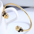 Vintage gold hollow skeleton open cuff bracelet with punk gothic skull design - Gold