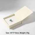 Blue heart-shaped gemstone ring displayed in a premium cream flip-top jewelry gift box - Specialty Paper / Paper Jewelry Box / Rice White/White