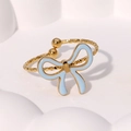 Golden twisted band ring featuring a light blue enamel bow charm with open adjustable design - Sky Blue