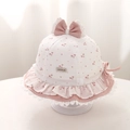 Detail of pink heart floral baby sun hat with large bow and delicate lace brim trim - 48cm (5-18 Months) / Pink