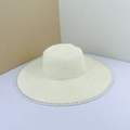 Elegant white straw hat with wide brim and intricate lace edge trim for summer sun protection - Creamy White