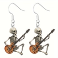 Detail of gothic rock skeleton acrylic earrings featuring a skull playing guitar - Rock Skeleton