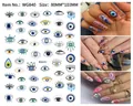 Detail view of Evil Eye nail art stickers WG840 showing size 80mmx103mm and blue eye patterns - WG840