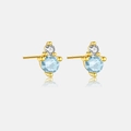 Close-up of S925 silver gold-plated stud earrings with sky blue and clear crystal stones - March/Light Blue