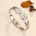 Silver stainless steel spring cuff bracelet with white enamel flowers and clear crystals - Steel
