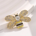 Broche abeille dorée avec cristaux clairs et émail noir jaune sur fond blanc - Doré