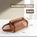 Mini orange mesh nylon storage pouch with zipper and side handle measuring 11x6.5x5.5cm - 11x6.5x5.5cm / Orange
