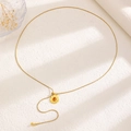 Macro detail of golden sunflower necklace with tiger eye stone and adjustable chain - Gold Round Plate Tiger Eye Style (12285)