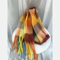 Winter plaid scarf with tassels in milk tea and orange tones on a white table - Colorful Plaid (9)