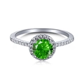 Eleganter S925 Sterlingsilberring mit grünem Zirkon im Halo-Schliff und Seitendiamanten - US 7 / Runder Grüner Edelstein Halo Stil / Silber+Grün+Weiß