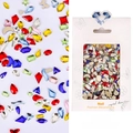 Vista macro di strass colorati per nail art con forme a stella e cuore misti - #04 Impatto Colori Misti