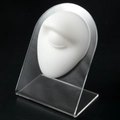 White silicone eye model for tattoo training on a transparent acrylic display stand - White-Eyes