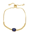 Adjustable gold bracelet featuring an oval blue zircon stone and elegant beads - Blue