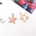 Ciondolo a stella marina rosa in lega con retro dorato per orecchini fai-da-te - Stella Marina Rosa (15x18mm)