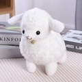 Cute white plush sheep toy with soft curly fur and a small golden bell ornament - White Sheep with Bell