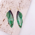 Green gradient cicada wing earrings with gold veins and foil on cream travertine stone - Dreamy Green Gold Foil