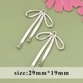 Silver bow-shaped pendant charm for DIY jewelry in polished 29mm x 19mm finish - ME5611B - Silver Bow Knot - 1pc