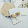 Detail of floral and cream acetate heart hair clips on Fashion Jewelry display card - Purple & Yellow Patchwork