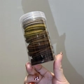 Elastic seamless hair ties in earth tones packaged in a clear cylindrical plastic bottle - 10 Pieces in Jar / Coffee Series