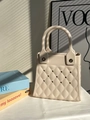 Cream-colored EVA tote bag with decorative diamond cutouts and round handles - Apricot