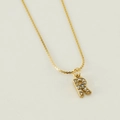 Minimalist gold necklace featuring a diamond-encrusted letter R pendant on a thin snake chain - Letter R