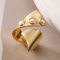 Macro shot of gold wrap ring featuring polished texture and three white pearl inlays - Triple Pearl Style (14133)