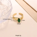 Detailed view of gold multi-layer beaded ring with marquise-cut green gemstone accent - Green