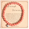 Pink zebra jasper beaded bracelet with heart charm on a vintage gift card background - Rhodonite Heart With Card Style