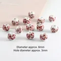 8mm white ceramic beads with red plum blossom floral patterns for DIY jewelry - 8mm Red Floral