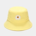 Close-up of small daisy flower embroidery on a bright yellow cotton bucket hat - M (56-58cm) / Yellow