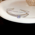 Macro detail of silver double-layer bangle featuring a square zircon and micro-pave setting - Square Zircon Double Layer Open Style (4# Bracelet-Silver)