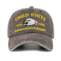 Close-up of eagle embroidery on a vintage washed brown 250th anniversary baseball cap - Coffee
