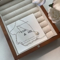 Elegant S925 silver necklace with white pearl pendant on display card with white roses - Silver Wrapped Pearl Pendant (XL434-2)