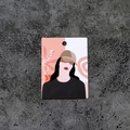 Detail view of a creative printed jewelry display card with girl illustration on grey background - Impression No.1 (100 Sheets)
