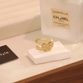 Detail of gold-plated double-band ring featuring a zircon-encrusted bow on stone base - Style 5: Classic Velvet Bow Clip