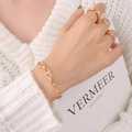 Goudkleurige ankerschakel armband en minimalistische open ringen set voor dames - Gouden Ankerschakel Armband & Ring Groep-E299