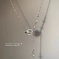 Elegant Saturn moonstone necklace with star charms in a polished silver finish - X1016 Silver - Planet Theme