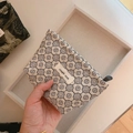 Macro shot of jacquard floral mini pouch with simple wish label for cosmetics - Silver Grey Lattice Flower