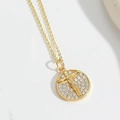 Gold-plated coin necklace featuring a crystal-encrusted crucifix pendant on an O-chain - Crucifix Jesus