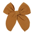 Detailed close-up of a mustard yellow bow hair clip with textured cotton linen fabric - Mustard Yellow (32)