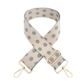 Close-up of beige polka dot wide adjustable canvas shoulder strap with gold metal hooks - Beige With Blue Dots
