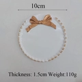 Weißes rundes Schmucktablett mit goldener Schleife und Punkten, 10cm Dekoteller-Design - Rund / Weiß
