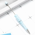 Customizable beadable pen featuring blue and white leaf patterns with silver metal accents - Light Blue and White Leaves (37)